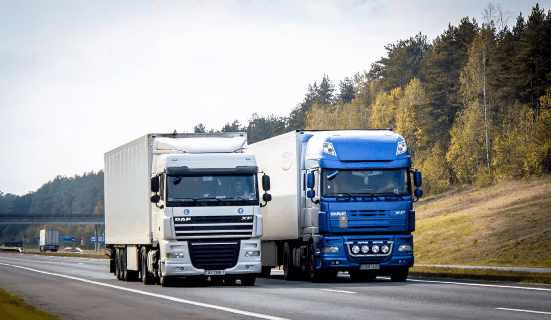 Al Raheem Cargo Service trucks in operation on the highway