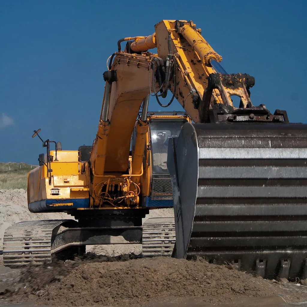 Excavator digging earth at a construction site